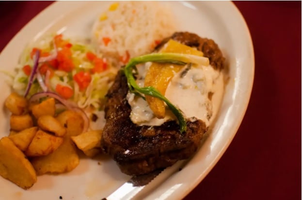 Char-grilled Ribeye Steak Con Rajas from El Asador Steakhouse
