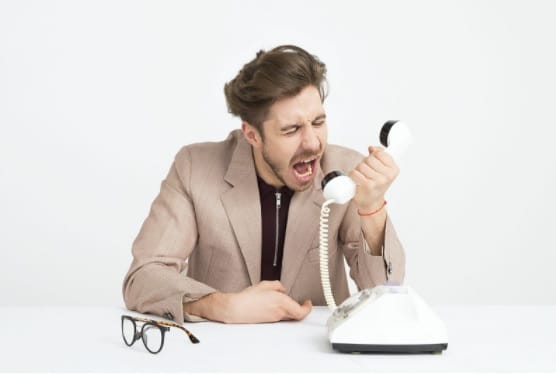 Frustrated man on a phone call