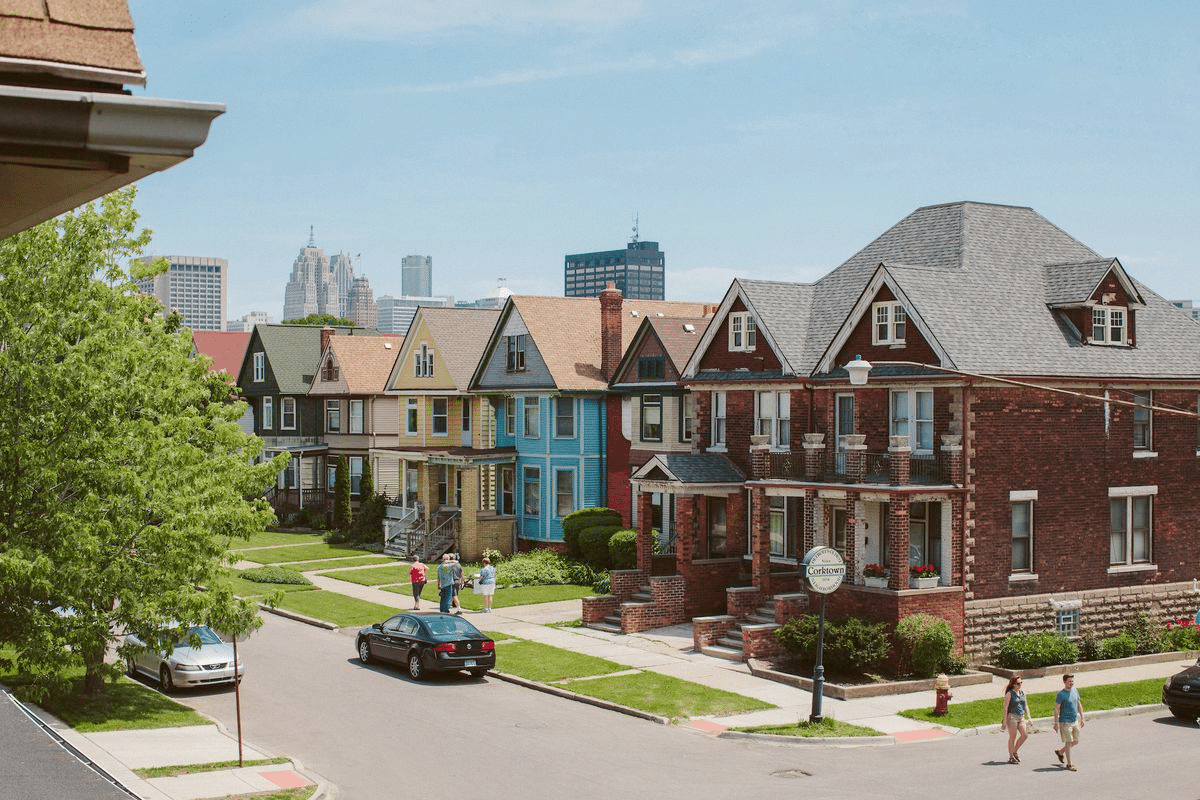 live A residential Detroit neighborhood with locals walking around.